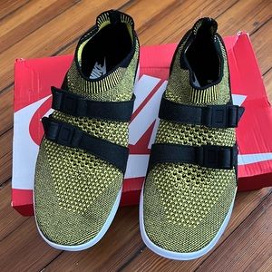 Nike Air light weight slip on shoes.